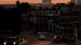 El sol se pone en Cuba y La Habana va quedando a oscuras por un corte de luz el 26 de junio de 2024. 