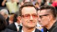 El vocalista de U2 Bono llegando a los premios Oscar, 2014. (AP). 