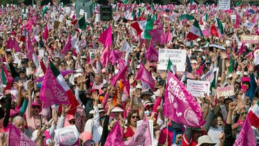 People take part in the opposition march For our democracy called by various organizations to demand a free vote in the upcoming June 2 presidential election, at the Zócalo square in Mexico City on February 18, 2024.&nbsp;