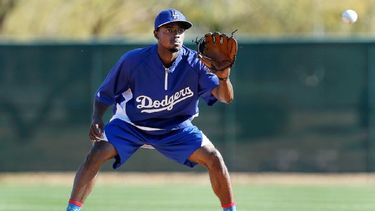 Gordon fue líder en triples y bases robadas. (AP)