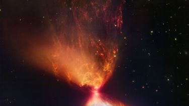 Esta imagen proveída por el Instituto de Ciencia del Telescopio Espacial el 16 de noviembre del 2022 muestra una protoestrella dentro de la nebulosa oscura L1527 con el material de nebulosa que alimenta su crecimiento, capturada por el Telescopio Espacial James Webb de la NASA. 