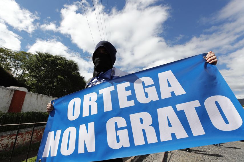 Activistas nicaragüenses participan en una manifestación contra el régimen de Ortega. 