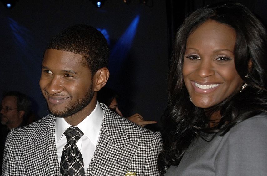 Usher junto a su exesposa. Tameka Raymond (AP)