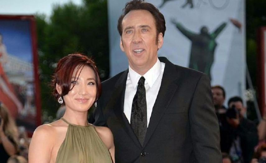 Cage con su tercera esposa Alice Kim.