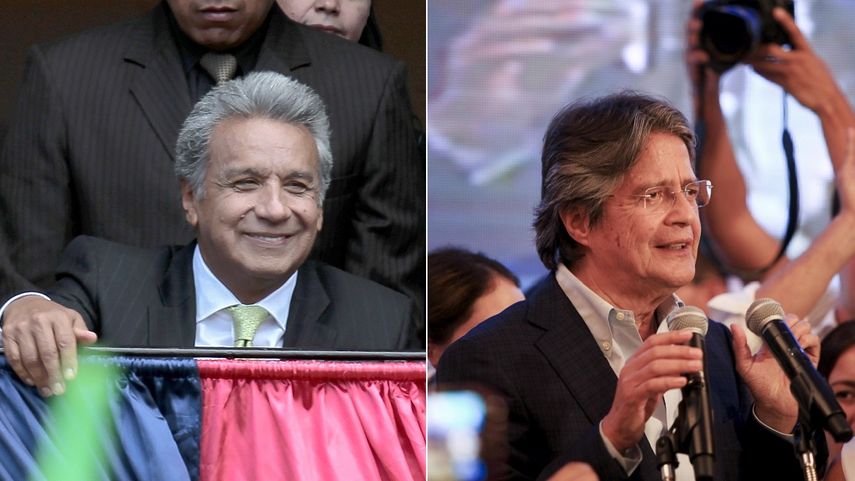 Lenín Moreno (izq.), a quien el CNE ecuatoriano da como ganador irreversible en las elecciones de este domingo, y Guillermo Lasso, candidato por la oposición, que califica de ilegítimos los resultados.