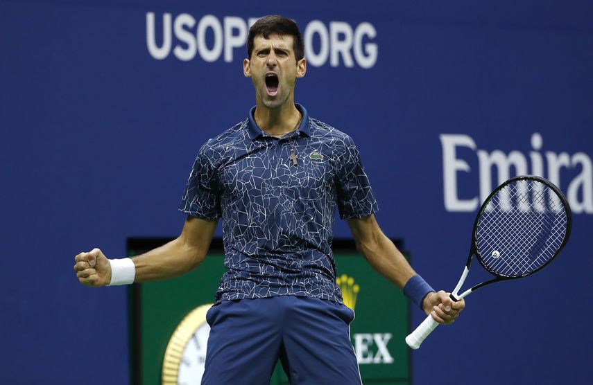 En esta foto del 9 de septiembre de 2018, Novak Djokovic tras quebrarle el saque a Juan Mart&iacute;n del Potro en la final del Abierto de Estados Unidos en Nueva York.&nbsp;