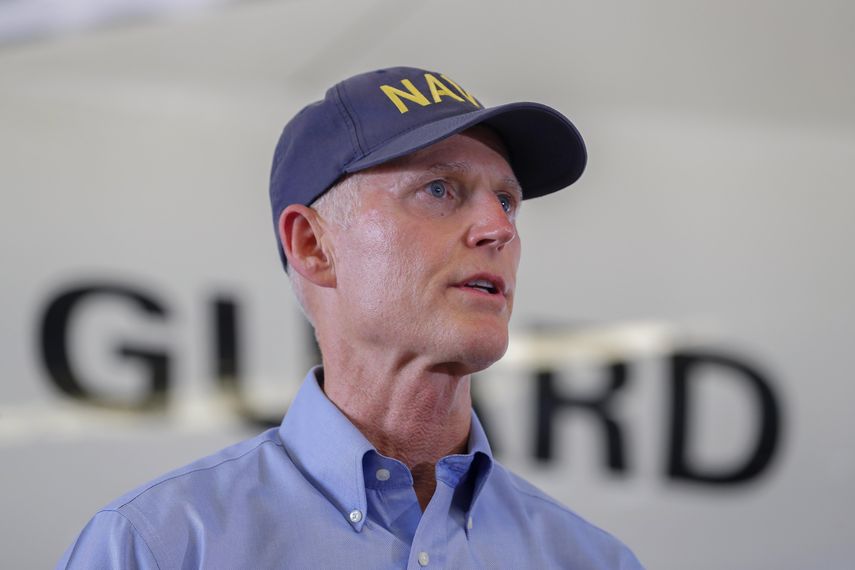 El gobernador Scott.