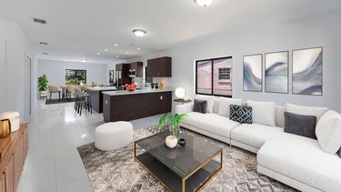 Vista de la cocina-comedor y family de una propiedad de Bluenest.