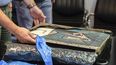 Esta fotografía del folleto tomada y publicada por la policía griega el 29 de junio de 2021 muestra una pintura recuperada de Picasso titulada Cabeza de mujer, en Atenas, Grecia, el 29 de junio de 2021.