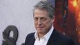 El actor británico Hugh Grant llega al estreno en Los Ángeles de la película Dungeons and Dragons: Honor Among Thieves.