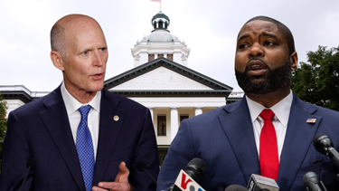 El senador Rick Scott (izq.) y el congresista Byron Donalds.