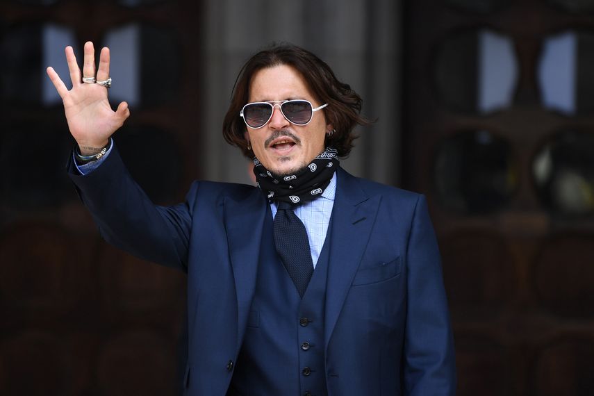 El actor estadounidense Johnny Depp llega para asistir al sexto d&iacute;a de su juicio por difamaci&oacute;n contra News Group Newspapers (NGN), en el Tribunal Superior de Londres, el 14 de julio de 2020.