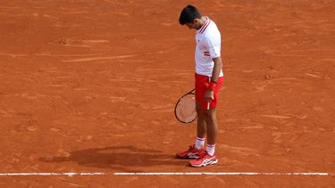 El serbio Novak Djokovic reacciona durante su partido de individuales de tercera ronda contra el británico Daniel Evans&nbsp; &nbsp; &nbsp;