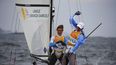 Santiago&nbsp;Lange y Cecilia Carranza de Argentina reaccionan al ganar la medalla de oro en la categoría Nacra 17 mixta