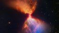 Esta imagen proveída por el Instituto de Ciencia del Telescopio Espacial el 16 de noviembre del 2022 muestra una protoestrella dentro de la nebulosa oscura L1527 con el material de nebulosa que alimenta su crecimiento, capturada por el Telescopio Espacial James Webb de la NASA. 
