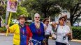 Maritza Urrutia, Margot Pérez Mena and Ana María León estaban entre los miles de venezolanos en el exterior llamados a votar en las elecciones primarias de la oposición para elegir al rival de Nicolás Maduro en las presidenciales de 2024, en Doral, Florida, el domingo 22 de octubre de 2023.
