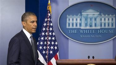 El presidente Barack Obama llega a dar una conferencia de prensa sobre la situación en Ucrania, el viernes 18 de julio de 2014, en la Casa Blanca. (Foto AP/Jacquelyn Martin)