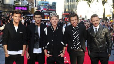 De izquierda a derecha: Louis Tomlinson, Zayn Malik, Niall Horan, Harry Styles y Liam Payne llegan al estreno mundial de One Direction: This Is Us en el Empire Leicester Square, en Londres, el 20 de agosto de 2013.