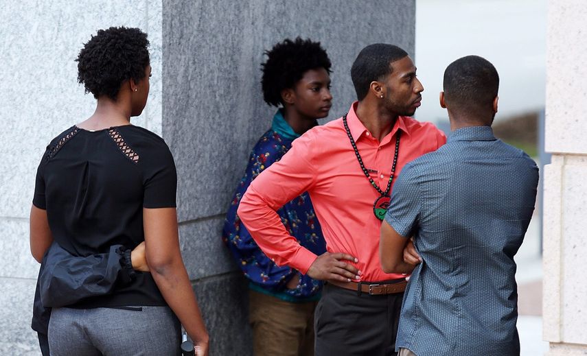 Miembros de la familia de Keith Lamont de Scott, el afroamericano de 43 años que murió el martes pasado en confusos hechos con la policía, en&nbsp;Charlotte, Carolina del Norte.&nbsp;