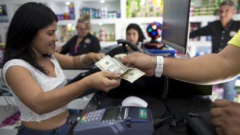 NOTICIA DE VENEZUELA  - Página 48 El-pago-dolares-comercios-se-ha-ido-extendiendo-el-territorio-venezolano