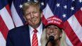 La representante estadounidense Marjorie Taylor Greene habla junto al expresidente de EEUU y aspirante presidencial para 2024 Donald Trump en un acto de campaña en Rome, Georgia, el 9 de marzo de 2024.