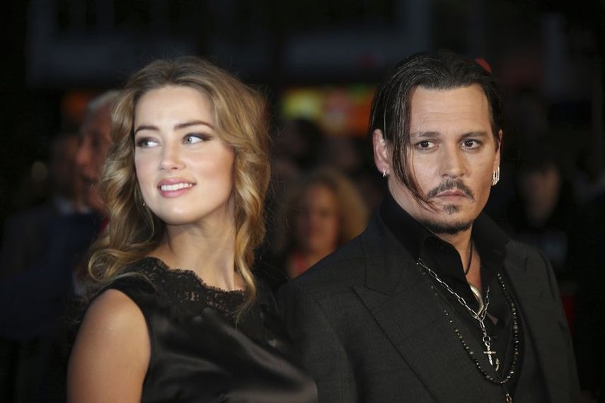 Amber Heard y Johnny Depp en 2015, durante la premiere de la película Black Mass, realizada en Londres. 