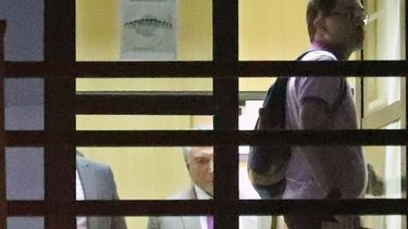 El expresidente brasileño Michel Temer (cen.) visto el lunes 25 de marzo en la sede de la Policía federal de Río de Janeiro, Brasil.