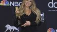 Mariah Carey posa con el premio Icon durante la entrega Billboard Music Awards en el Arena MGM Grand Garden, en Las Vegas.