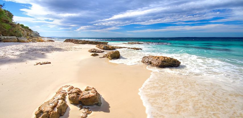 Hyams Beach, en Nueva Gales del Sur. Es uno de los destinos más fascinantes de Australia. La idea común de una playa se rompe al conocer este espacio.&nbsp;