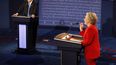 Trump y Clinton durante el debate