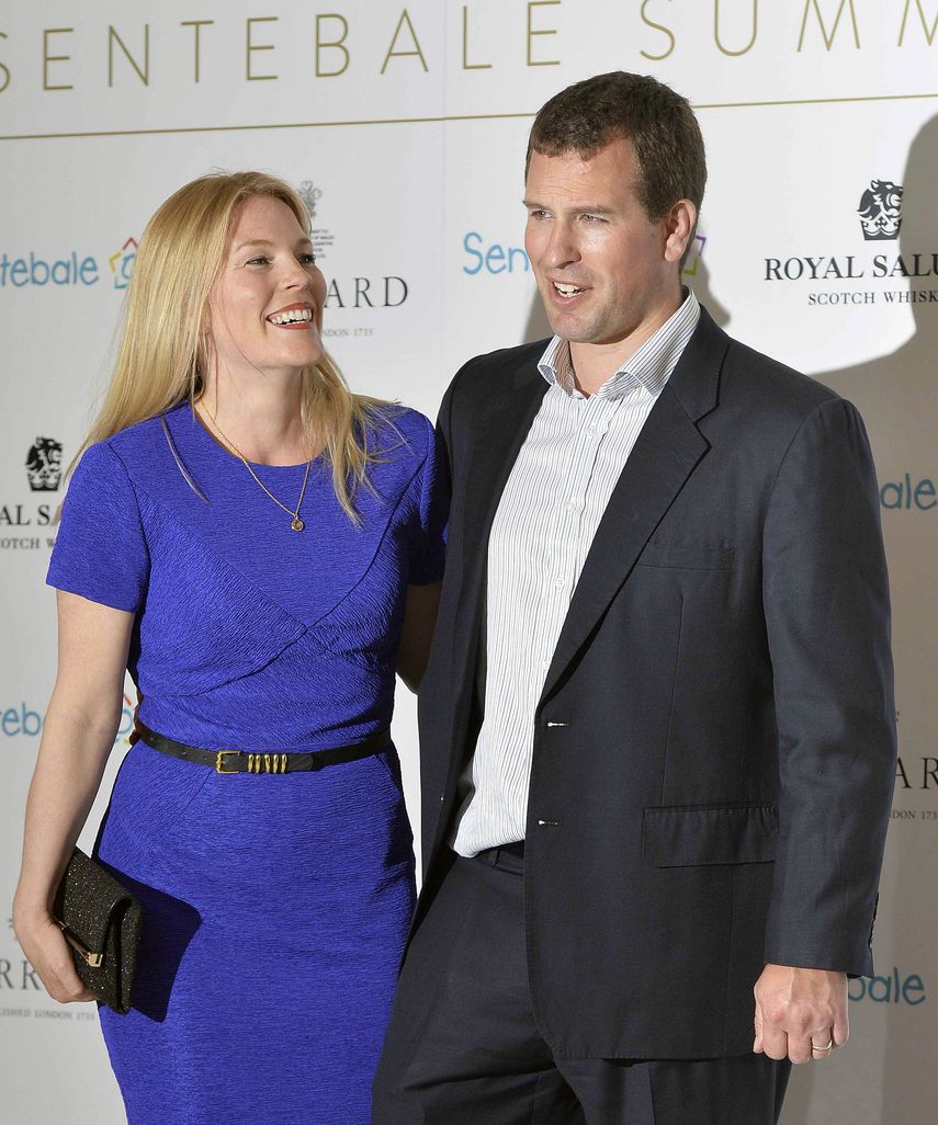 Foto tomada el 7 de mayo de 2014 en la que aparecen Peter Phillips y su esposa Autumn llegando al evento Sentebale Summer Party en London.