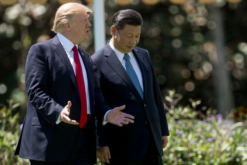 TRUMP  Y XI JINPING   (ED) JIM WATSON  AFP