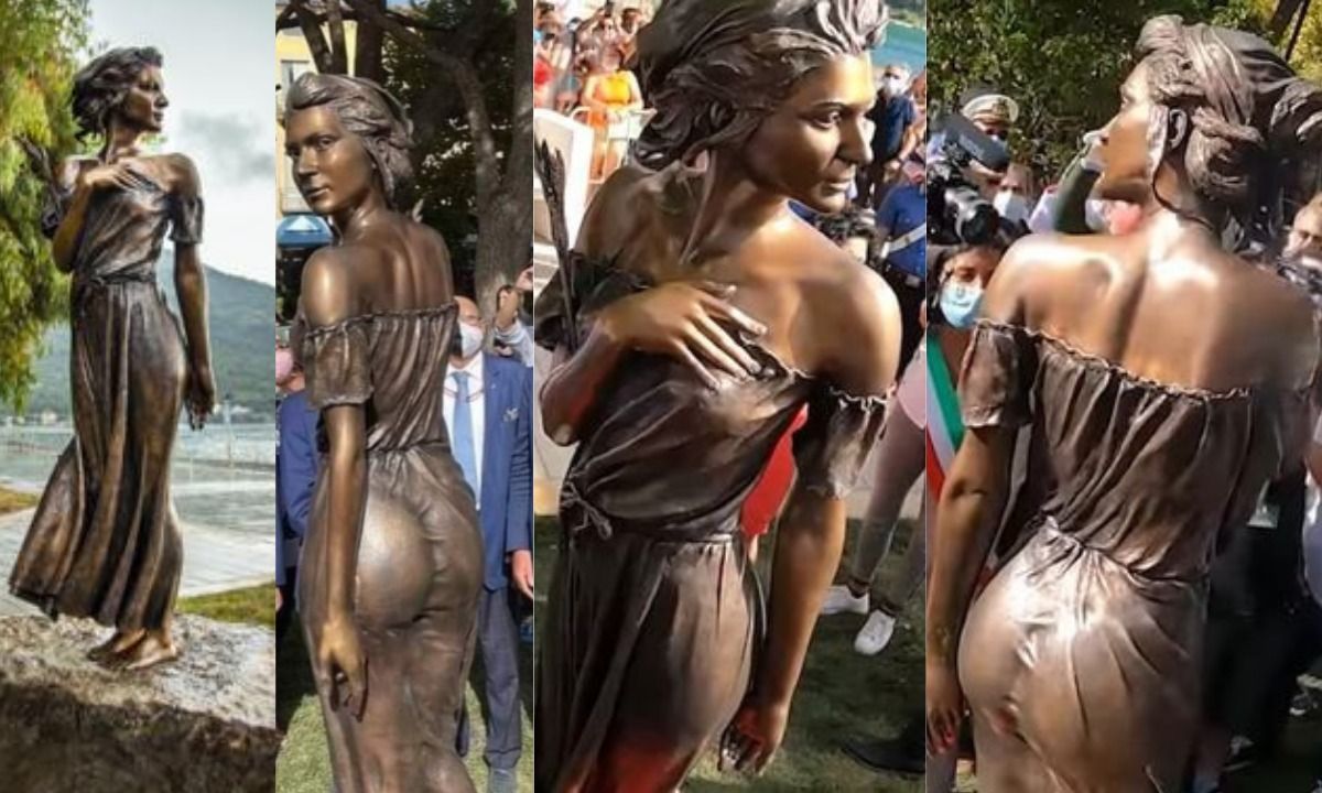Escultura de bronce de la Spigolatrice di Sapri en Sapri, Italia Escultura de bronce de la Spigolatrice di Sapri en Sapri, Italia