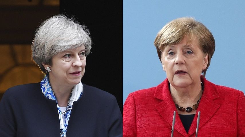 La primera ministra británica, Theresa May (izq.) y la canciller alemana, Angela Merkel (der.).&nbsp;
