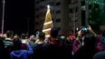 Palestinos cristianos en una celebración de iluminación de árbol de Navidad en Ciudad de Gaza, en diciembre de 2019.