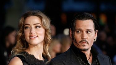 La actriz estadounidense Amber Heard con su esposo Johnny Depp. (EFE)