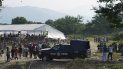 Migrantes llegan a un campamento donde las autoridades mexicanas emitirán permisos para que puedan continuar su camino hacia el norte, en San Pedro Tapanatepec, Oaxaca, México, el 5 de octubre de 2022. 