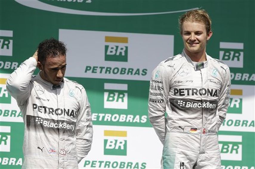 Hamilton (izquierda) y Rosberg han arrasado toda la temporada en la Fórmula 1. (AP)