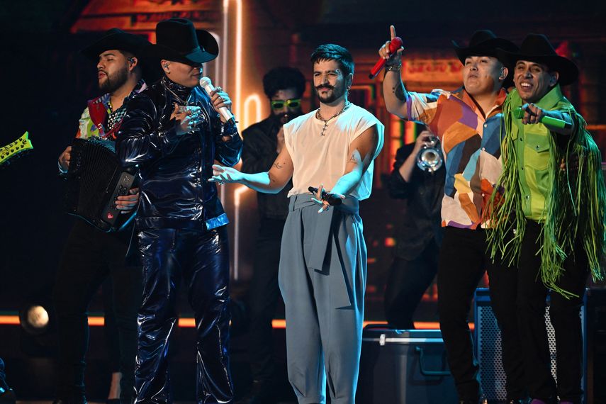 Grupo Firme y Camilo se presentan en el escenario durante los Latin Billboard 2022 en Watsco Center el 29 de septiembre en Coral Gables, Florida.