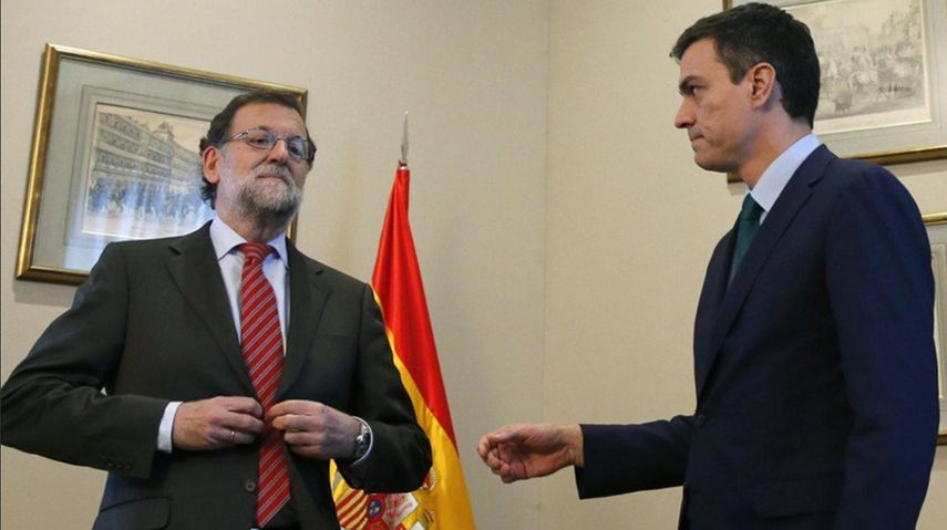 Mariano Rajoy, presidente del gobierno español y el líder del PSOE, Pedro Sánchez.