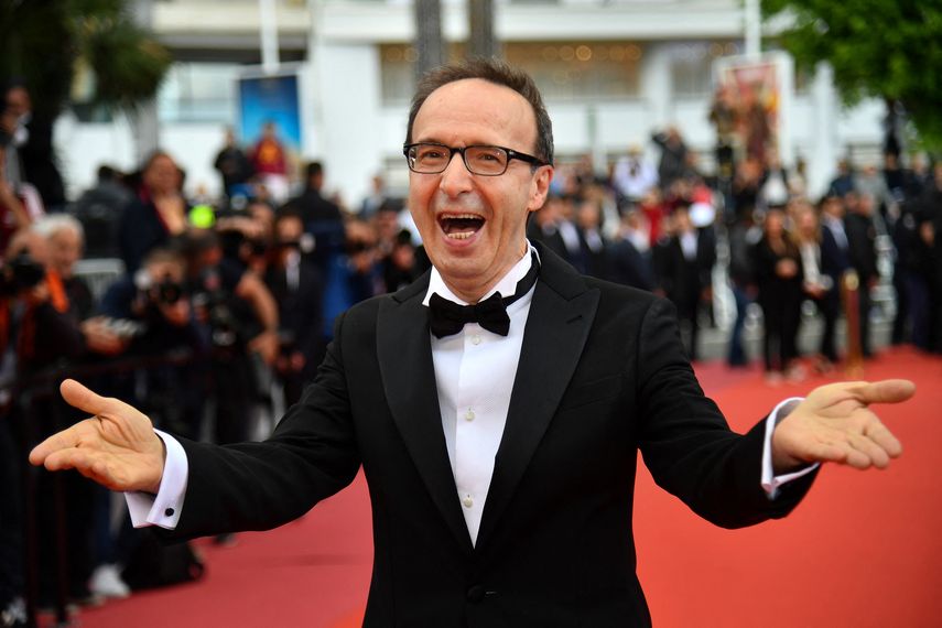 En esta foto de archivo tomada el 13 de mayo de 2018, el actor y director italiano Roberto Benigni reacciona en la 71 edición del Festival de Cine de Cannes en Cannes, sur de Francia. El italiano será honrado con un premio a su carrera en el Festival de Cine de Venecia de este año.