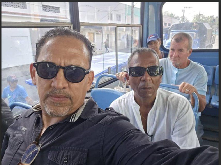 Rolando Rodríguez Lobaina, junto con Isael Poveda Silva, cuando se dirigían al evento en La Habana.