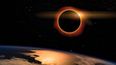Vista de un eclipse lunar desde el espacio, en 2017, con parte de la Tierra en primer plano.