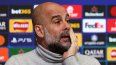 El entrenador español del Manchester City, Pep Guardiola, reacciona durante una conferencia de prensa en el campo de entrenamiento del club, el 28 de enero de 2025.