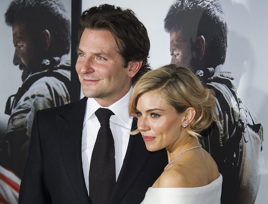 Bradley Cooper y Sienna Miller durante el estreno de American Sniper. (AP). 