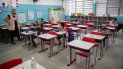 Una maestra trabaja con estudiantes, todos ellos con máscaras, durante el primer día de regreso a clases presenciales en medio de la pandemia de COVID-19 en la escuela pública Raúl Antonio Fragoso en Sao Paulo, Brasil, el lunes 8 de febrero de 2021. Una maestra trabaja con estudiantes, todos ellos con máscaras, durante el primer día de regreso a clases presenciales en medio de la pandemia de COVID-19 en la escuela pública Raúl Antonio Fragoso en Sao Paulo, Brasil, el lunes 8 de febrero de 2021.