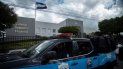 Una patrulla de la Policía vigila el edificio del Consejo Supremo Electoral, en Managua, Nicaragua. Una patrulla de la Policía vigila el edificio del Consejo Supremo Electoral, en Managua, Nicaragua.