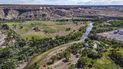 Vista del río Animas, tributario del San Juan, que es parte del sistema que alimenta el río Colorado en Nuevo México, en foto del 22 de julio del 2020 tomada en Farmington.