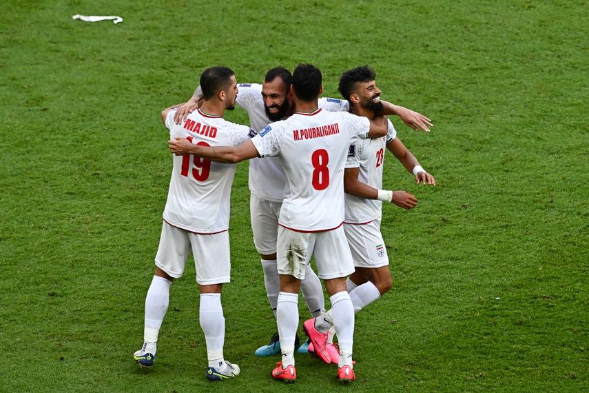 El equipo de Irán celebra su victoria frente a Gales en la segunda vuelta del Mundial de Catar, el 25 de noviembre de 2022.