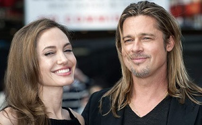 La actriz Angelina Jolie junto a su esposo Brad Pitt. (EFE). 